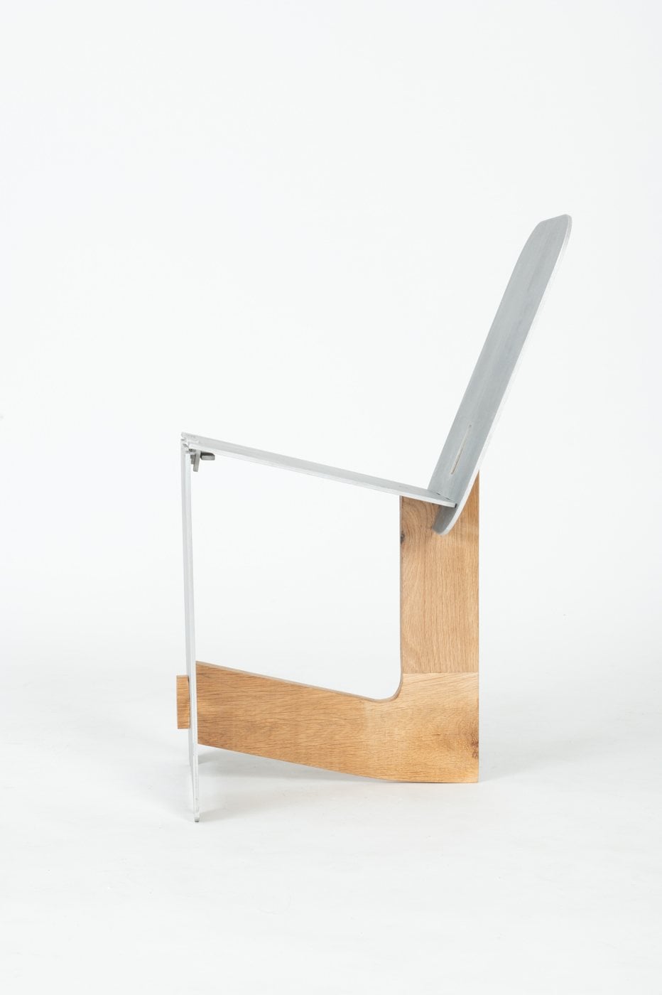 Lounge chair, close detail of the folded aluminum and oak joint